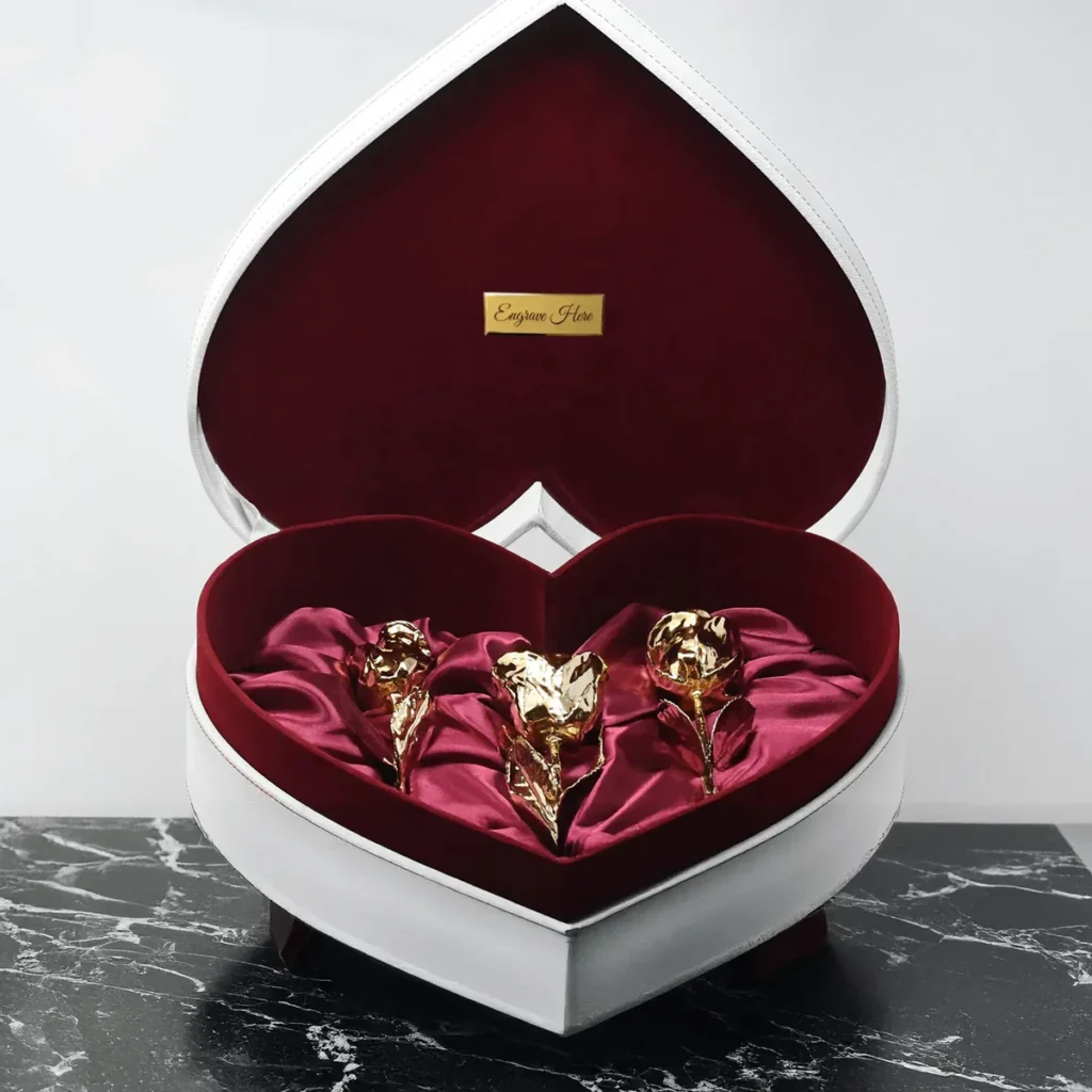 3 GOLD DIPPED ROSES 7" - CRIMSON VELVET HEART SHAPED LEATHER BOX